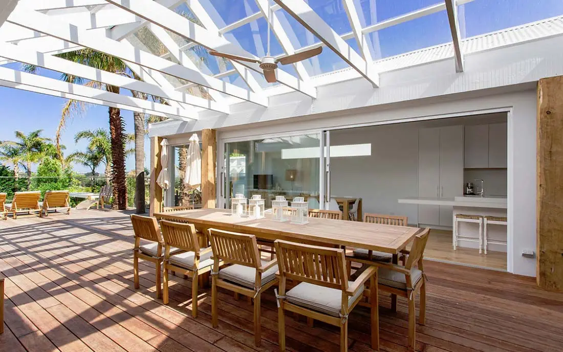 Stackable sliding doors opening onto outdoor terrace